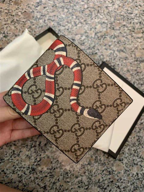 how can you tell if a gucci wallet is fake|gucci wallet real deal.